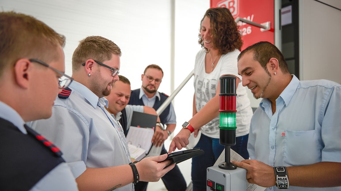 Employees attending a training session on energy-efficient driving.